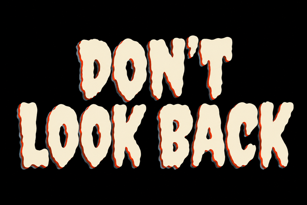 Custom Creepster Halloween font graphic featuring “Don't Look Back” in dripping orange horror lettering on a black background.